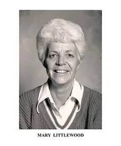 A black and white photo of an older woman.