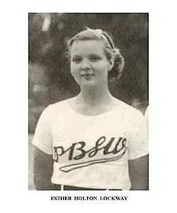 A young woman in a white shirt is smiling.