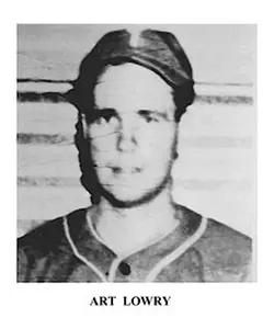 A black and white photo of an older baseball player.