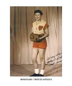 A young woman holding a baseball glove and standing in front of a curtain.