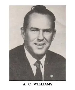 A black and white photo of an older man.