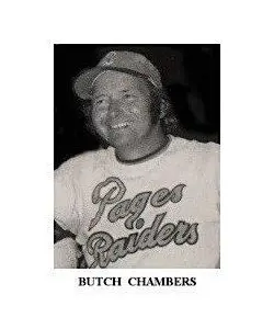 A black and white photo of a baseball player.