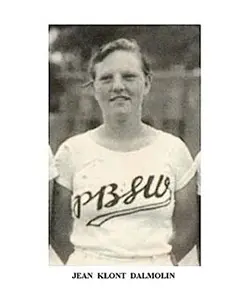 A black and white photo of a baseball player.