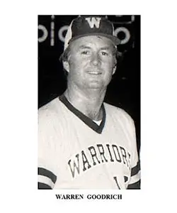 A black and white photo of a baseball player.