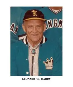 A man in a baseball uniform and hat.