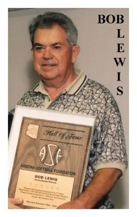 A man holding a plaque in front of him.